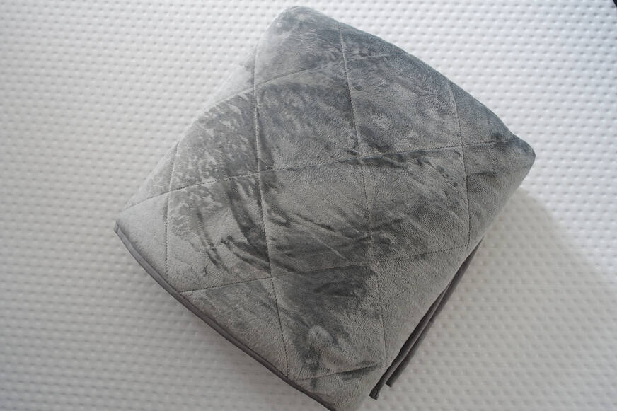 aeyla mela weighted blanket rolled up